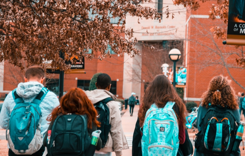 people wearing backpacks